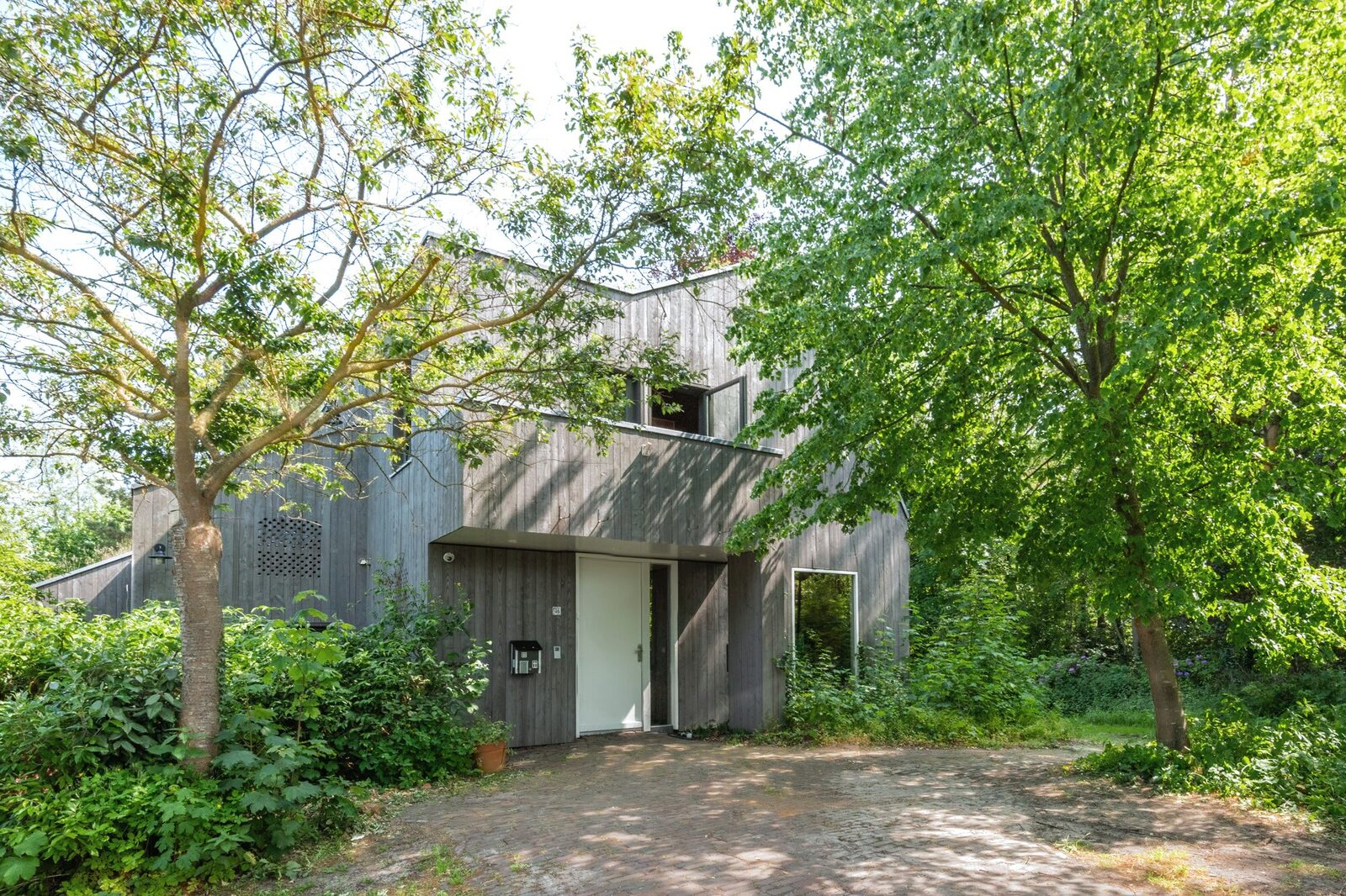 Het huis in het groen